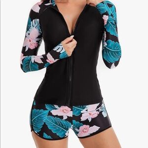 Brand New With Tags never worn. Long sleeve swim top and bottoms
